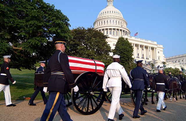 Outdoor funeral at the Capitol building.