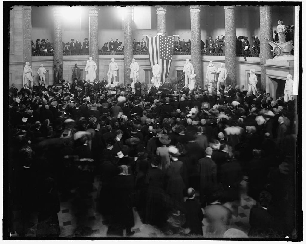 Black and white photograph of a crowd in National Statuary Hall