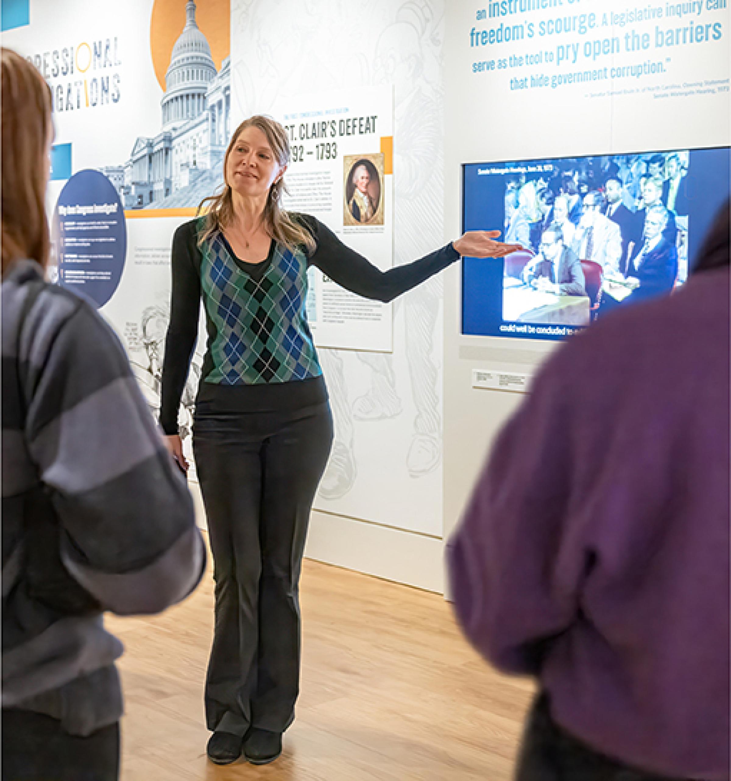 Woman talking to a small group