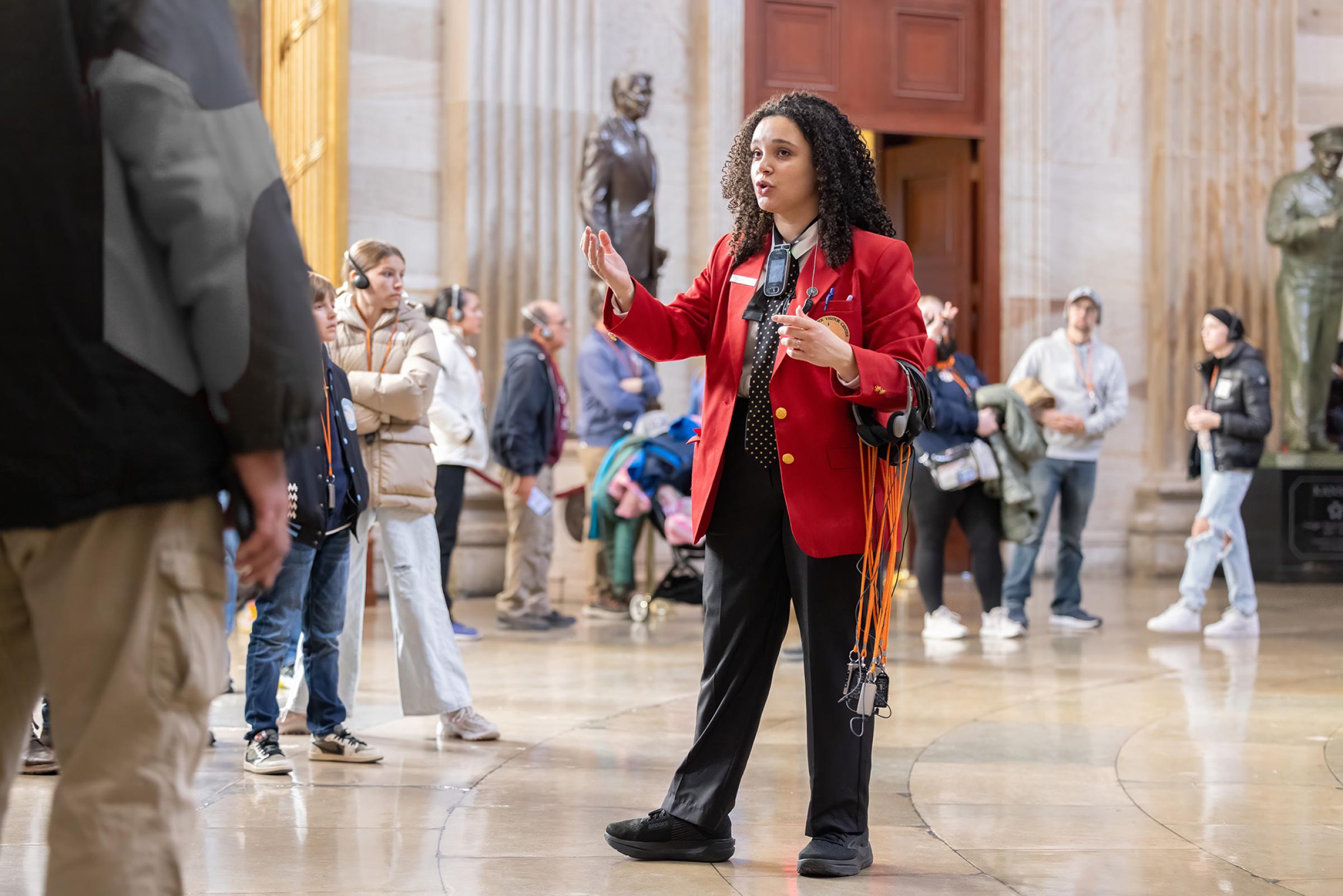A visitor guide helping guests. 