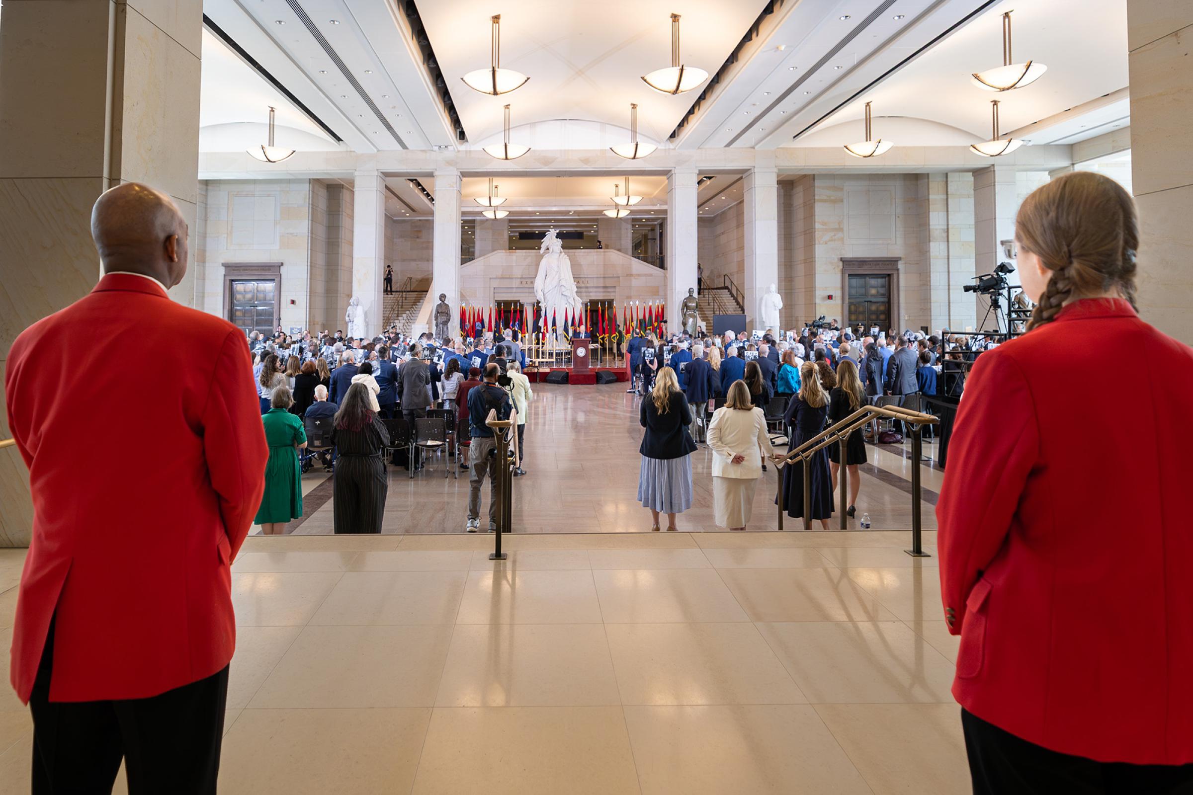 A visitor guide helping guests. 
