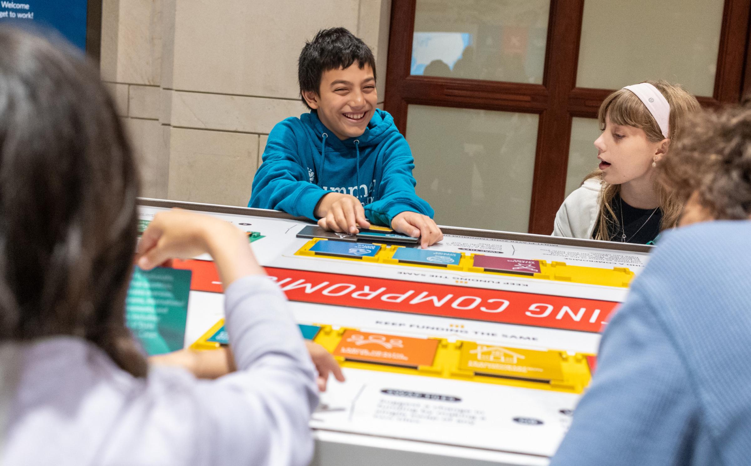 Children working at a table. 