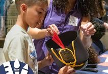 two people working with a Shako