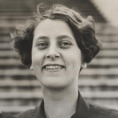 Black and white photo of a woman smiling