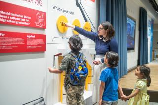 Children preparing to vote. 